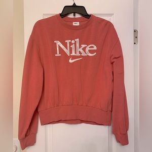 Pink women’s Nike sweater shirt